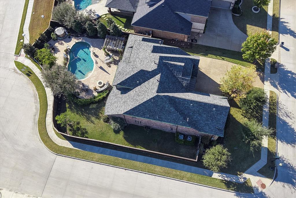2880 Redfern Drive Trophy Club, TX 76262 - Photo 37 of 40 an aerial view of a house with a garden and large tree