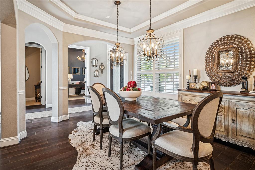 2880 Redfern Drive Trophy Club, TX 76262 - Photo 6 of 40 a view of a dining room with furniture window and wooden floor