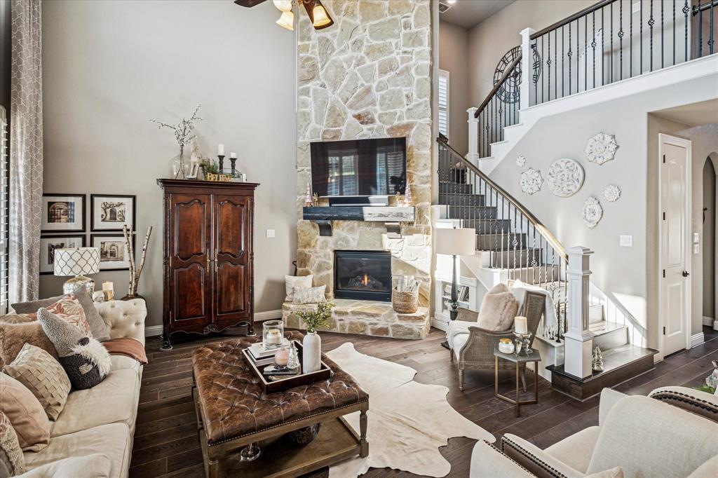2880 Redfern Drive Trophy Club, TX 76262 - Photo 9 of 40 a living room with furniture and a fireplace