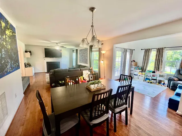 a view of a living room and dining room