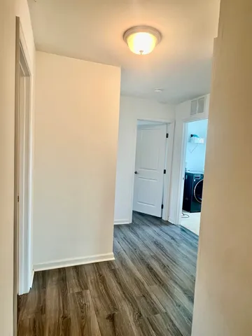 a bed room with furniture and a window