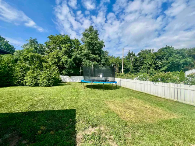 a view of a garden with a bench