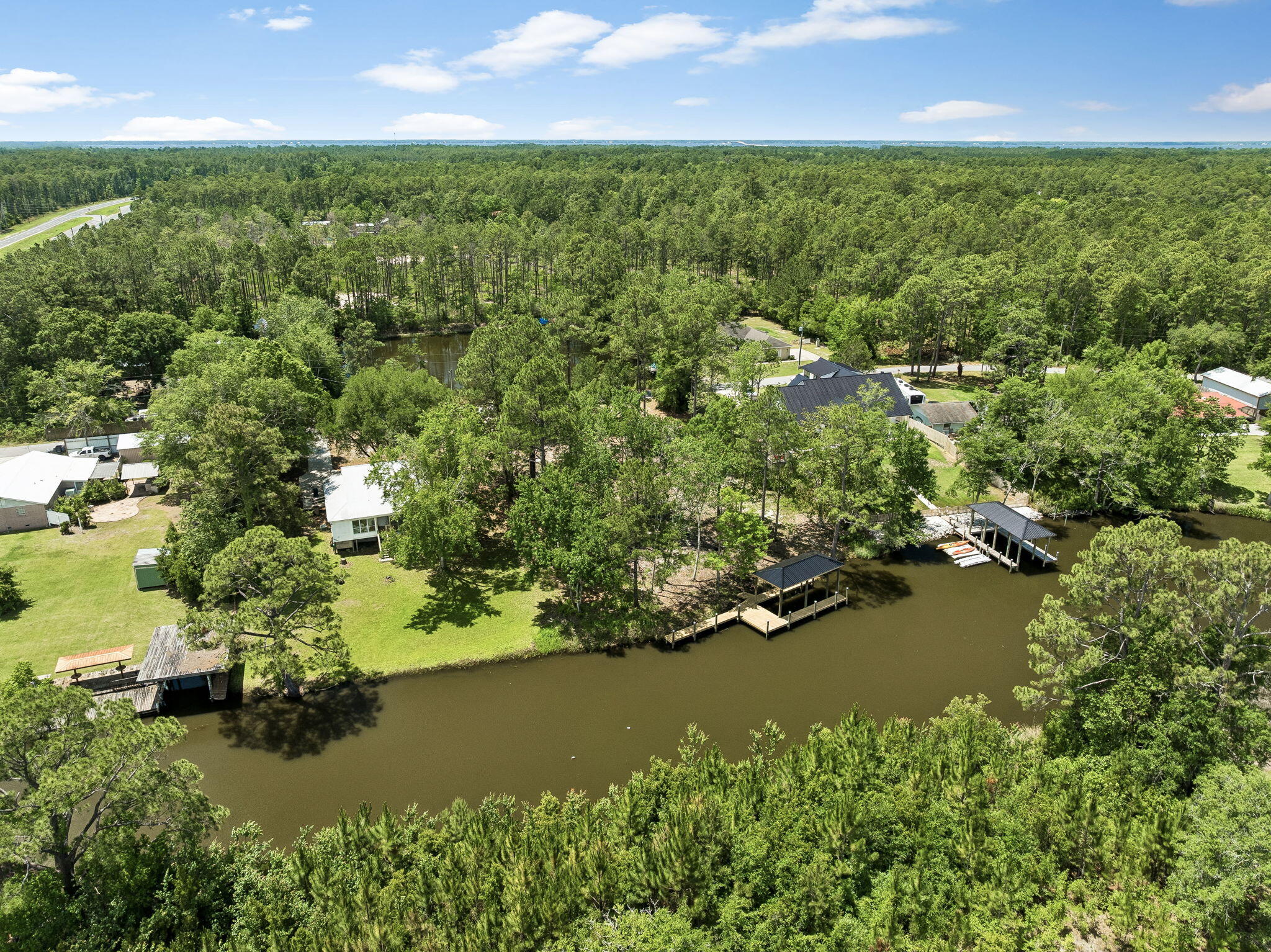 92 Waterside Lane Freeport, FL 32439 - Photo 4 of 28 an aerial view of residential houses with outdoor space and trees