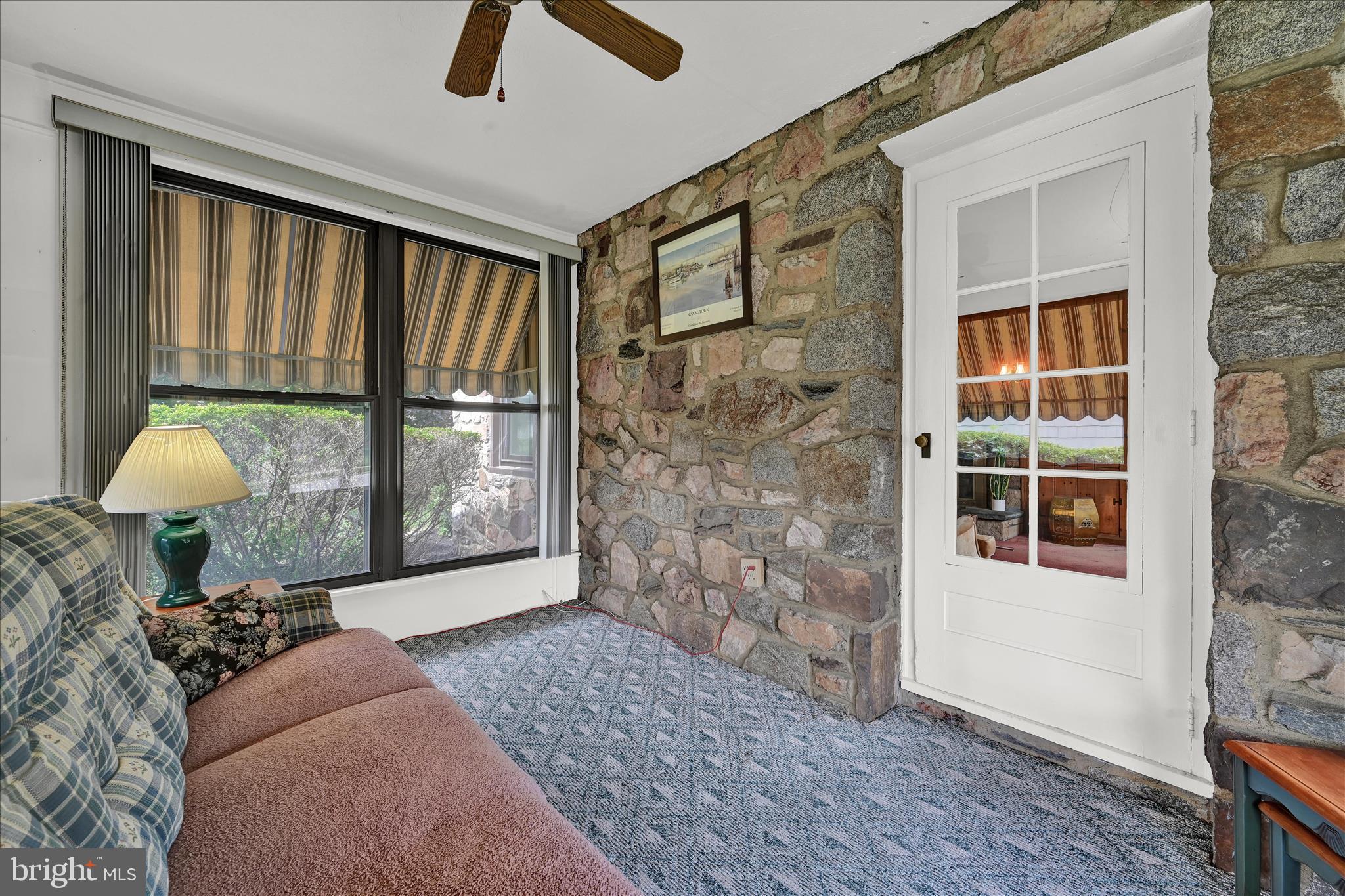 526 Argyle Road Drexel Hill, PA 19026 - Photo 11 of 42 Walls of Windows & a Ceiling Fan