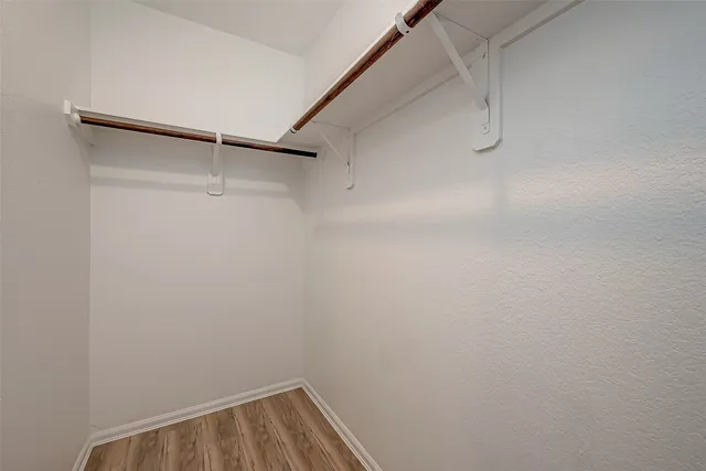 a view of small space with racks on the wall