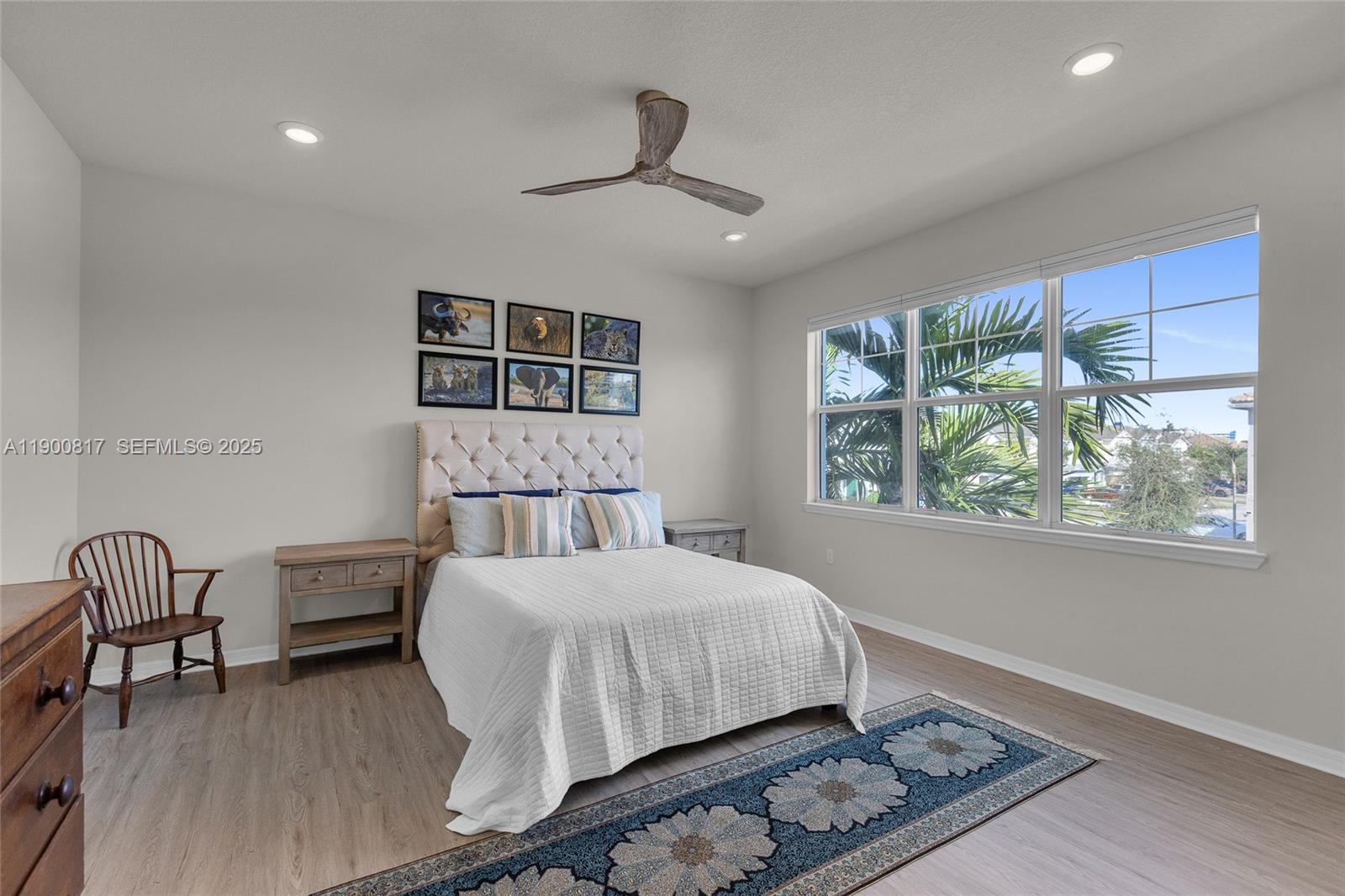 4810 Eucalyptus Drive, Unit 3 Hollywood, FL 33021 - Photo 15 of 32 a bedroom with a bed and a window