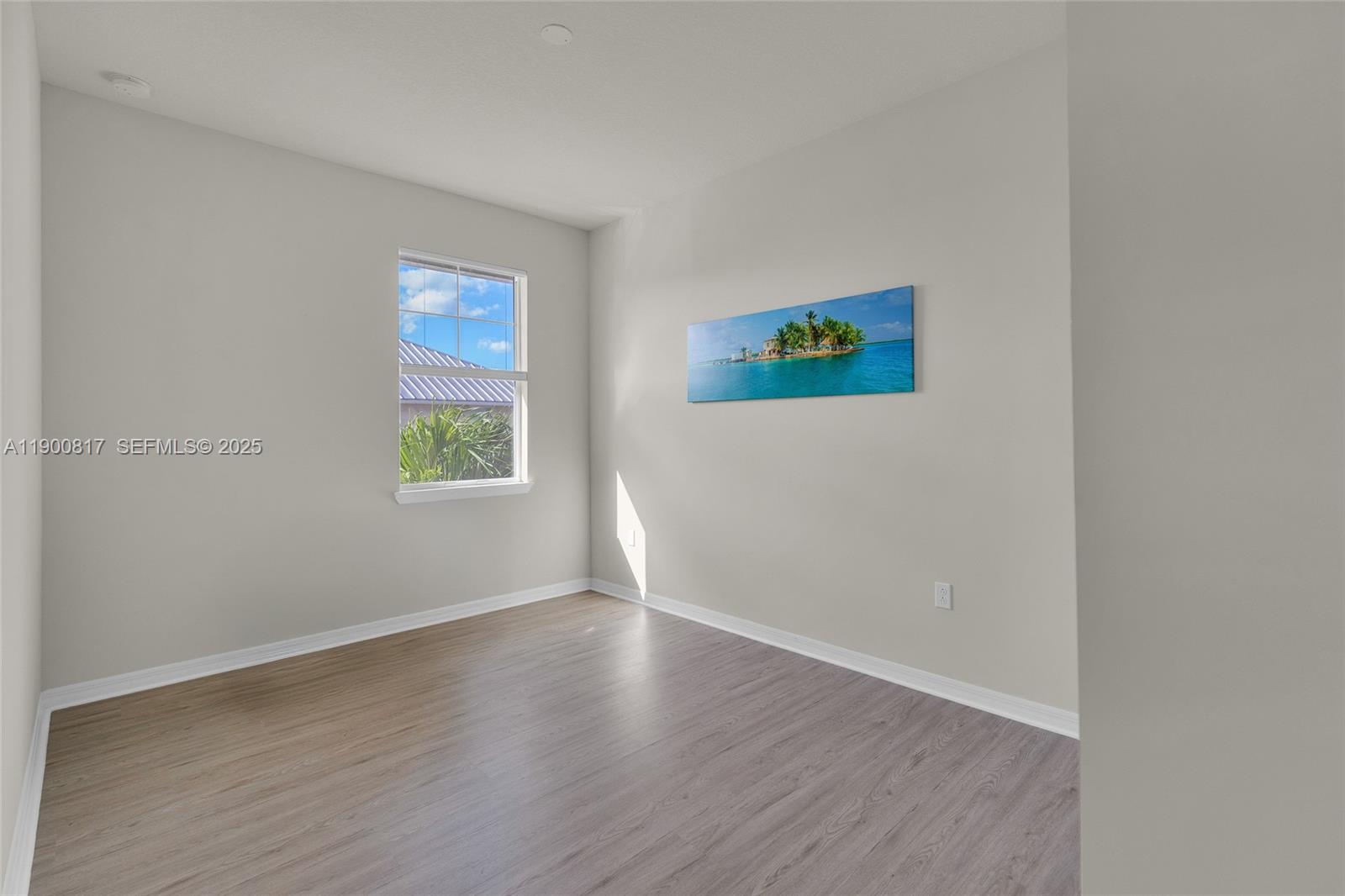 4810 Eucalyptus Drive, Unit 3 Hollywood, FL 33021 - Photo 17 of 32 an empty room with a window