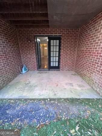 a view of empty room with windows