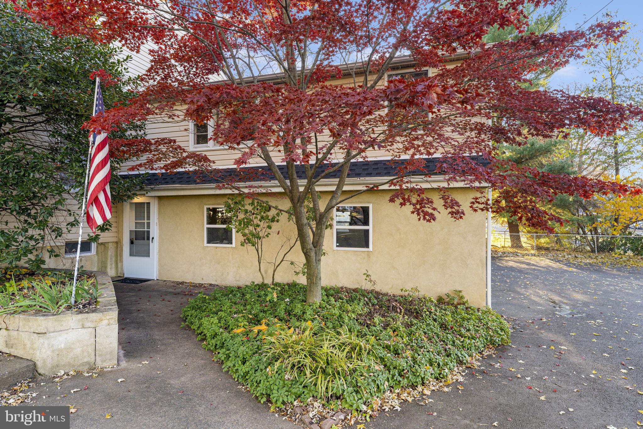 225 Pershing Avenue, Unit A Horsham, PA 19044 - Photo 1 of 19 a front view of a house with garden