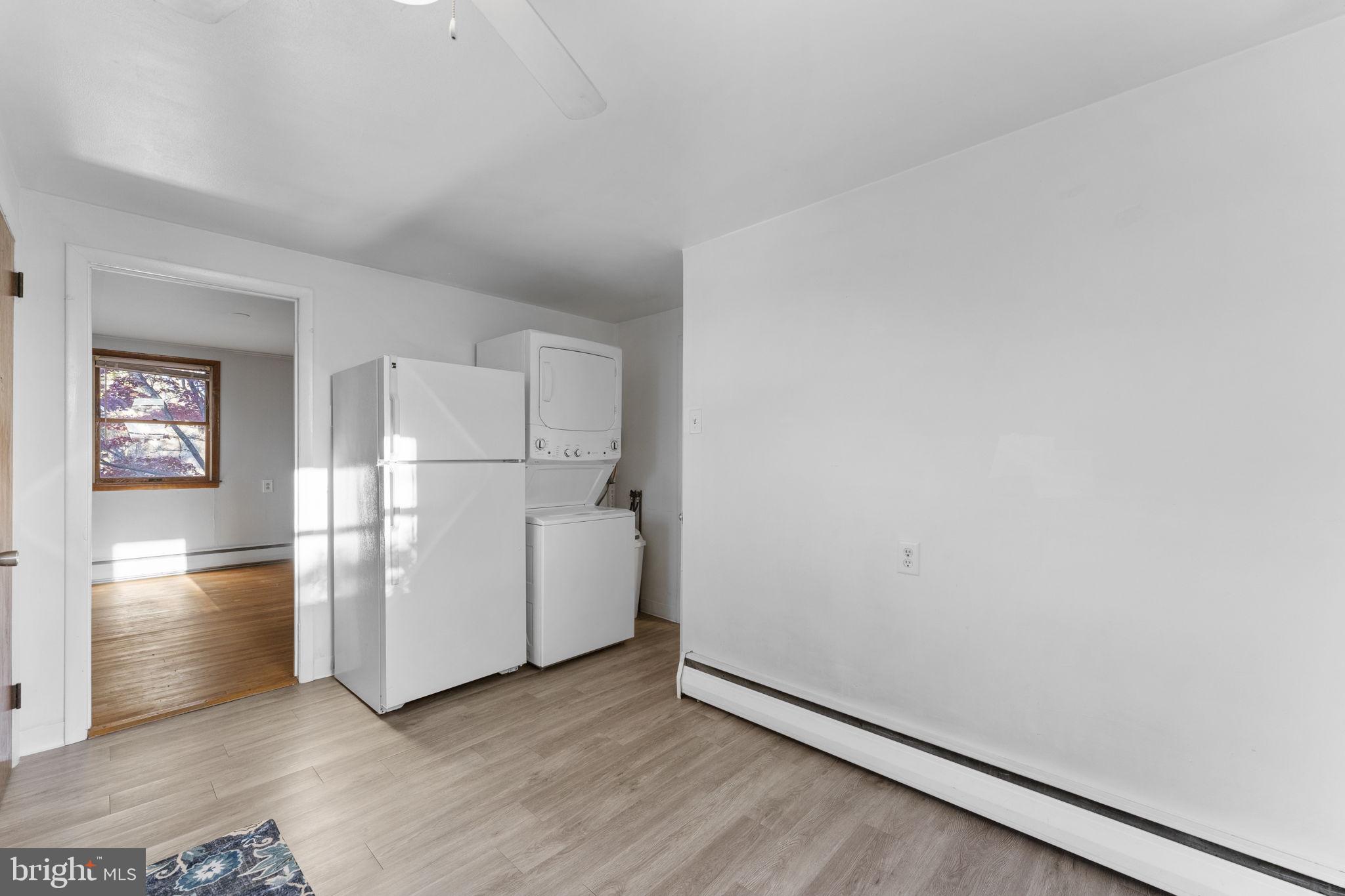 225 Pershing Avenue, Unit A Horsham, PA 19044 - Photo 12 of 19 a view of empty room with wooden floor