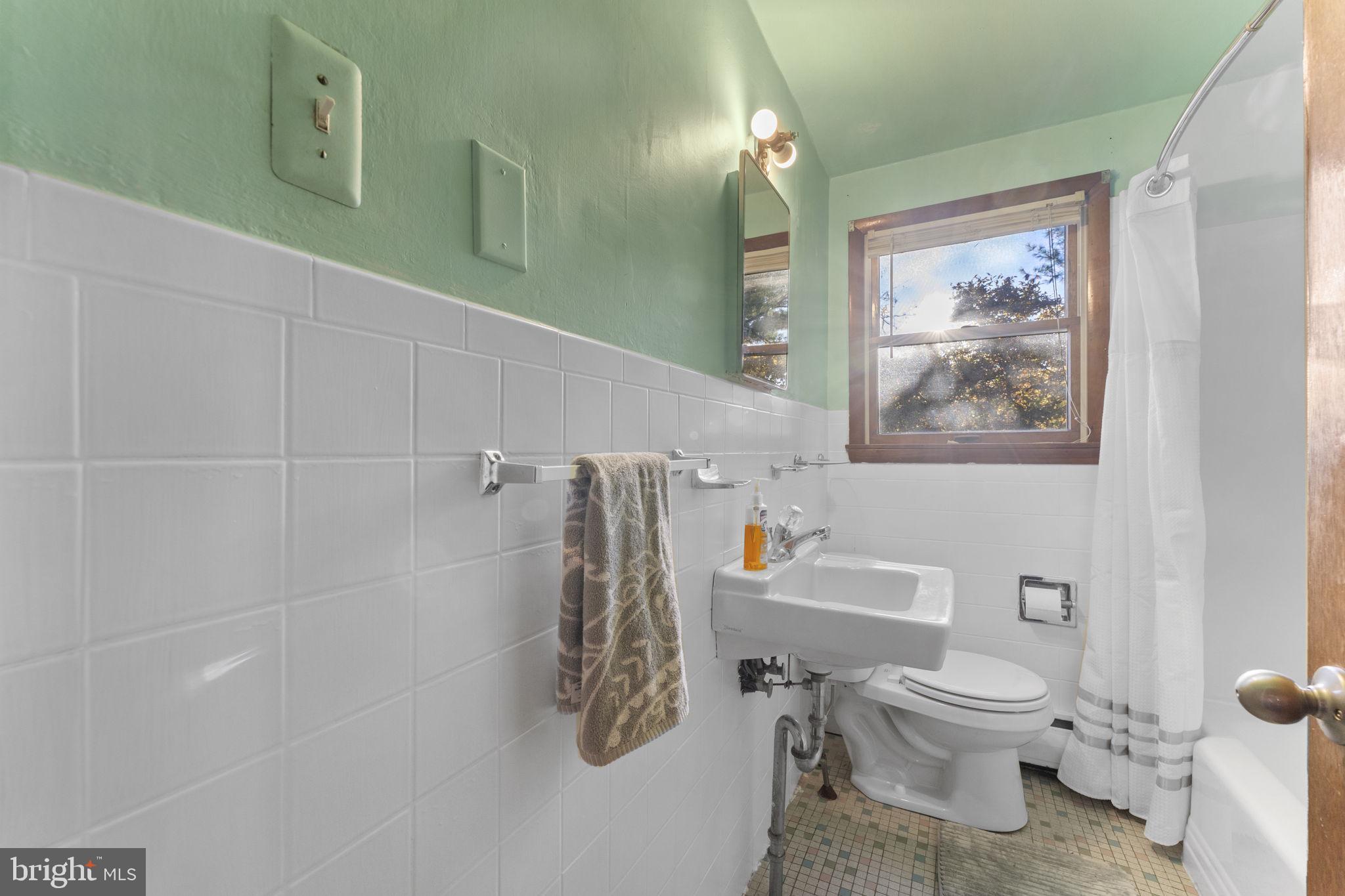 225 Pershing Avenue, Unit A Horsham, PA 19044 - Photo 18 of 19 a bathroom with a toilet and a shower