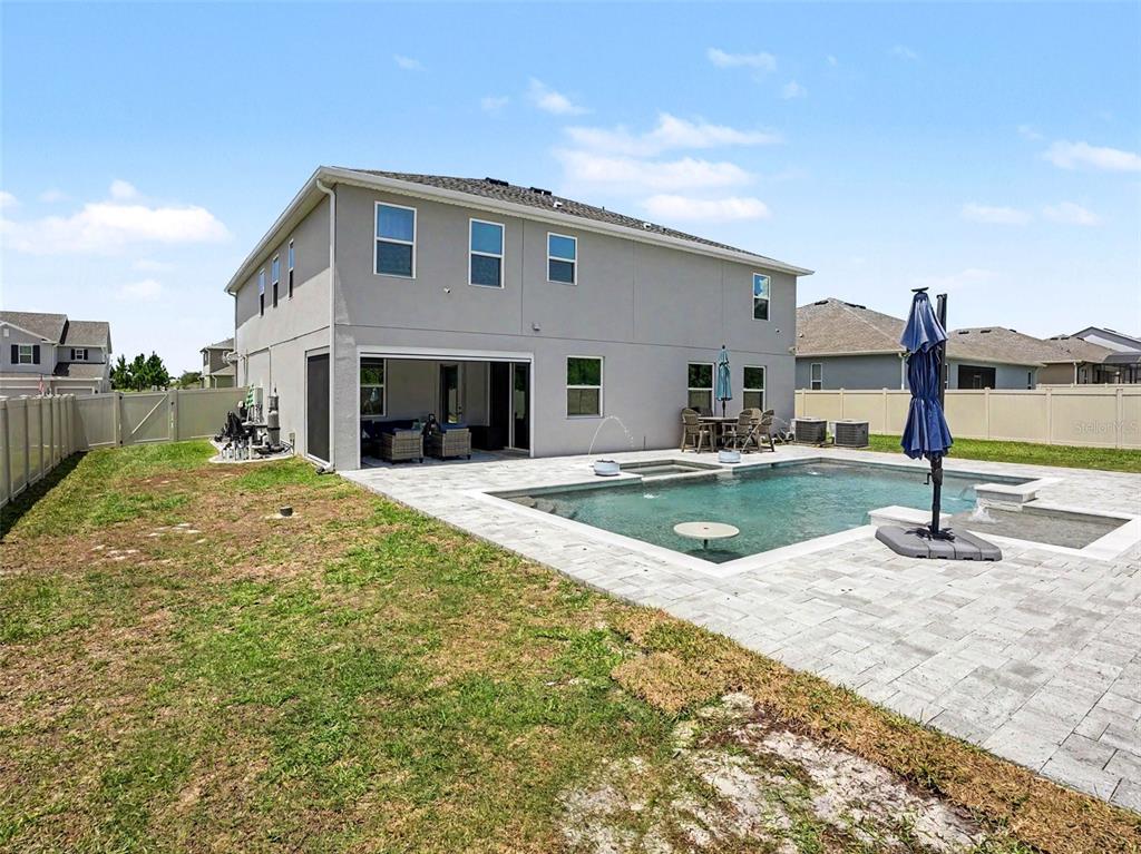 5270 Obsidian Gate Road Mount Dora, FL 32757 - Photo 46 of 50 a view of a house with swimming pool