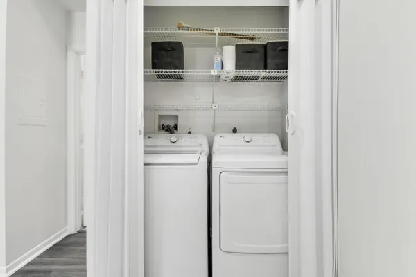 a utility room with dryer and washer