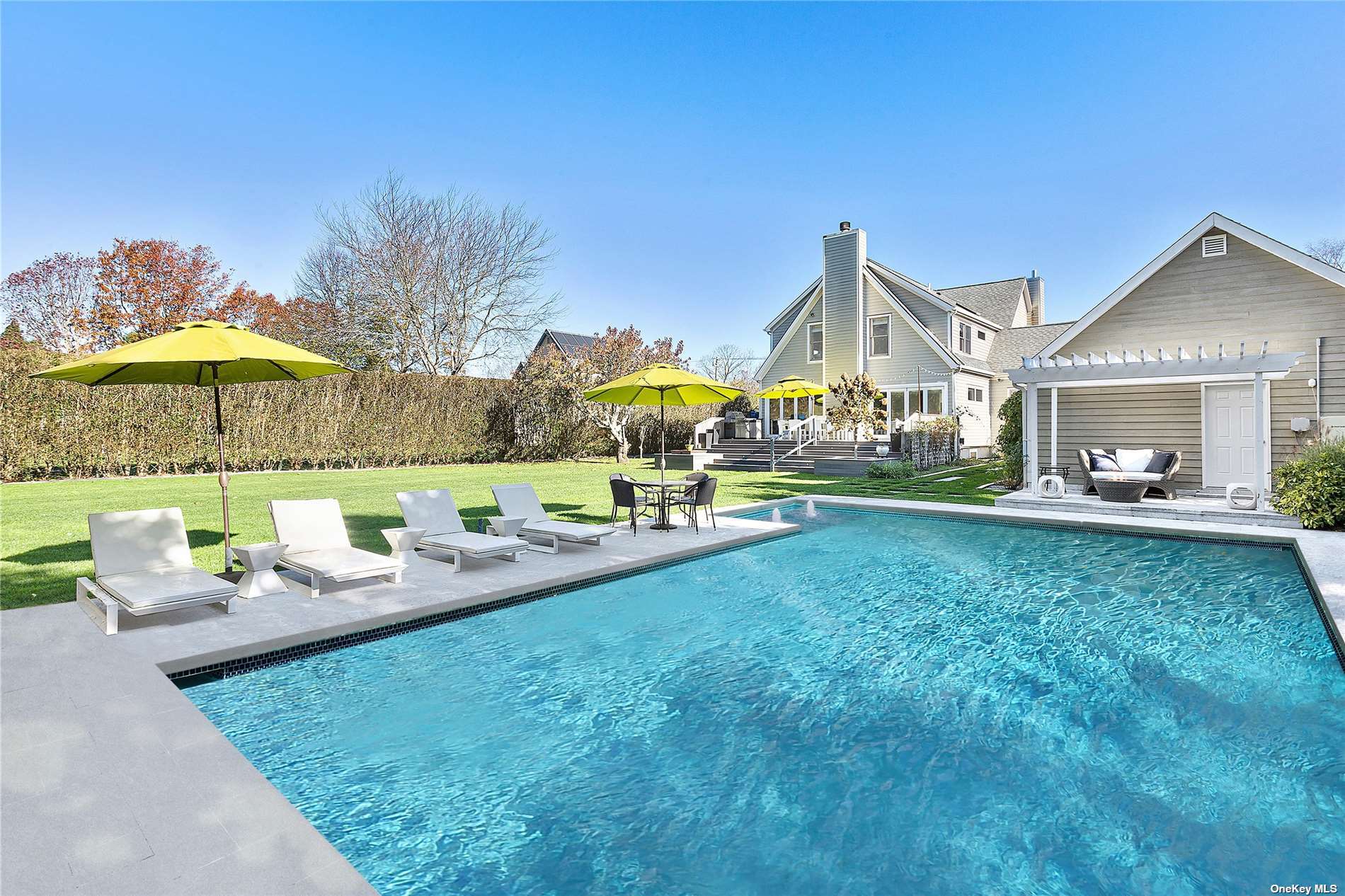 468 Blank Lane Water Mill, NY 11976 - Photo 1 of 1 a view of a house with patio and a yard