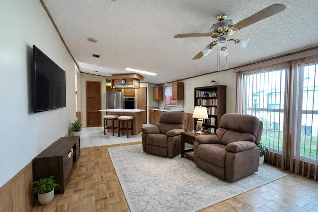 a view of a garden with sitting area
