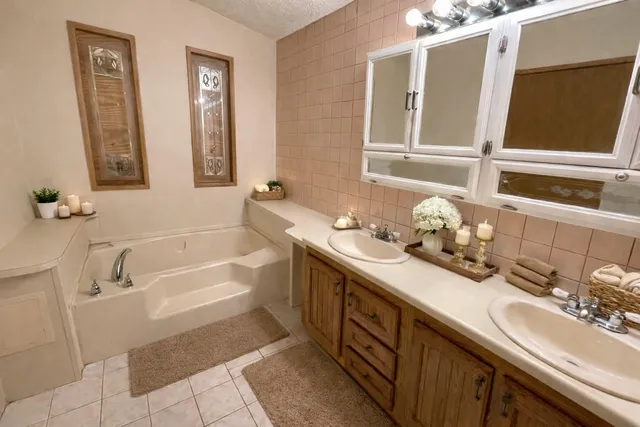 a view of swimming pool with a patio