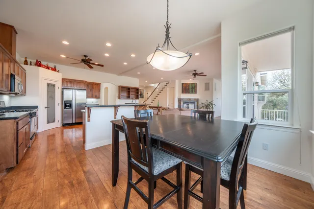 a view of an entryway with wooden floor