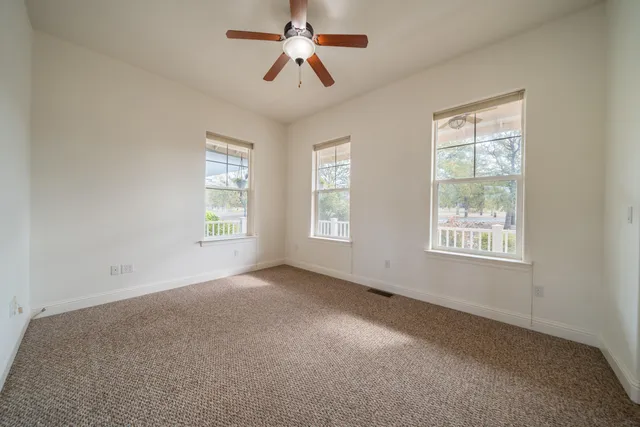 a view of outdoor space with deck and yard