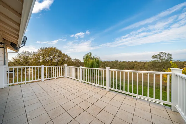 a view of a street with a building in the background