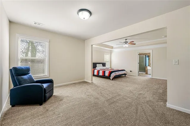 a view of livingroom with furniture and windows