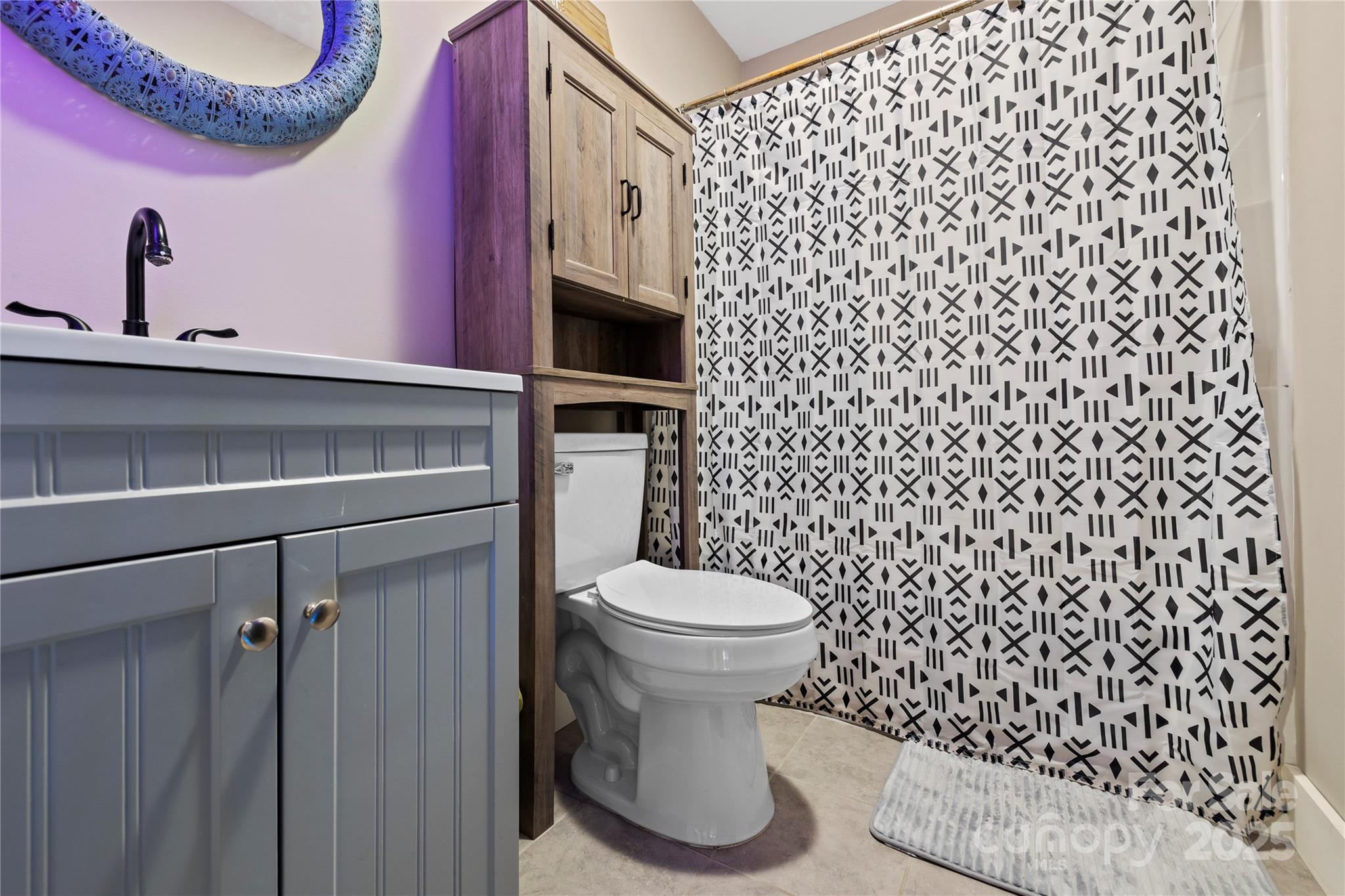 185 Ben Nevis Road Brevard, NC 28712 - Photo 26 of 42 a bathroom with a sink toilet and shower