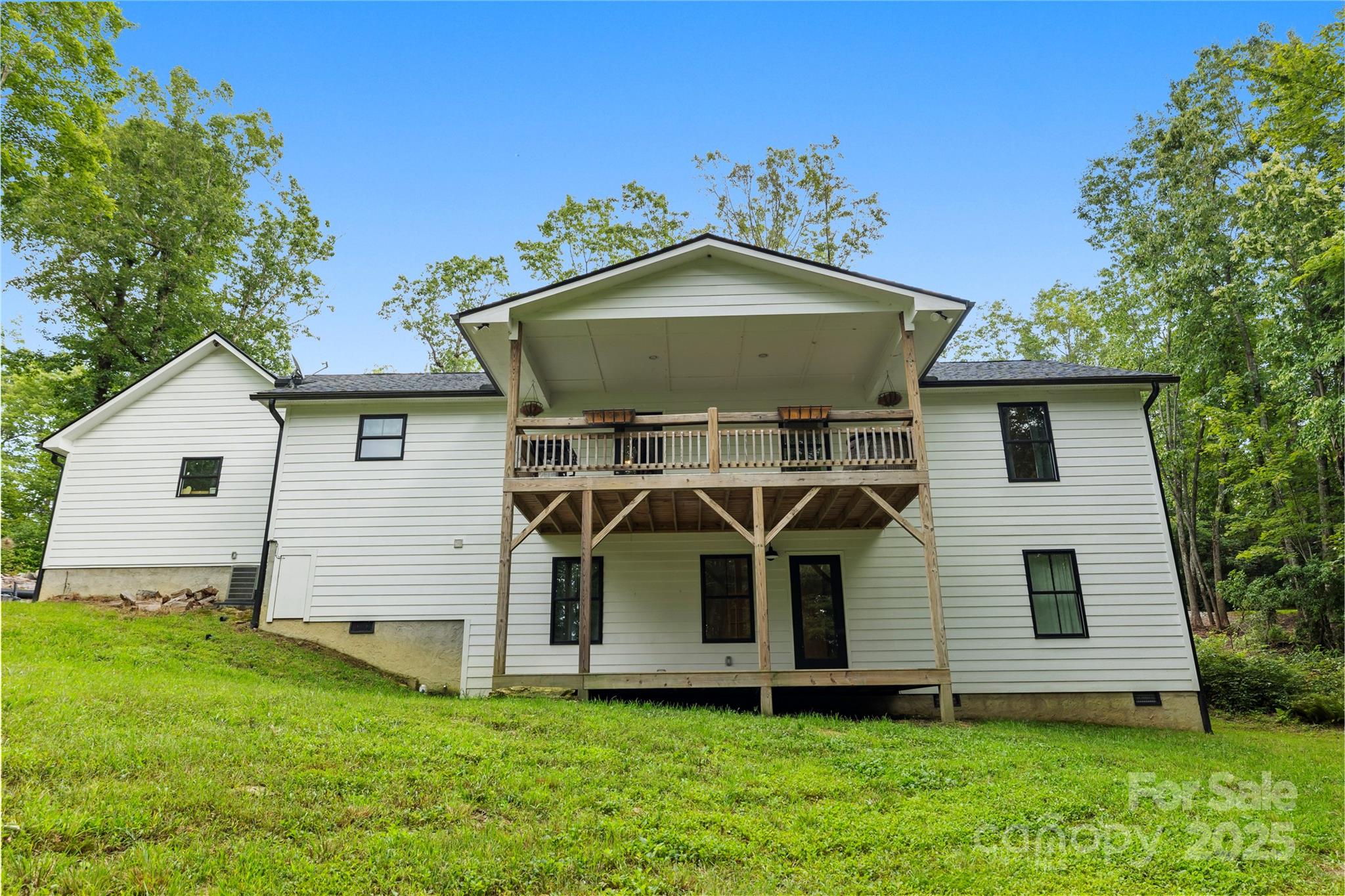 185 Ben Nevis Road Brevard, NC 28712 - Photo 3 of 42 a front view of a house with a yard