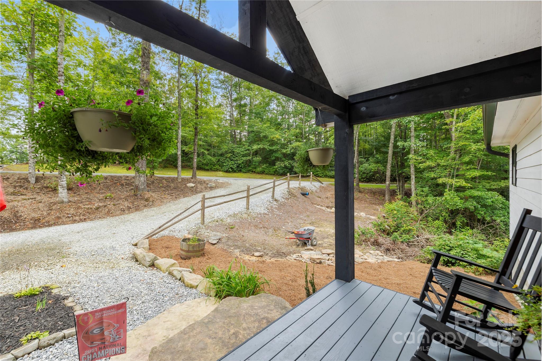 185 Ben Nevis Road Brevard, NC 28712 - Photo 32 of 42 a view of a porch with furniture and wooden floor