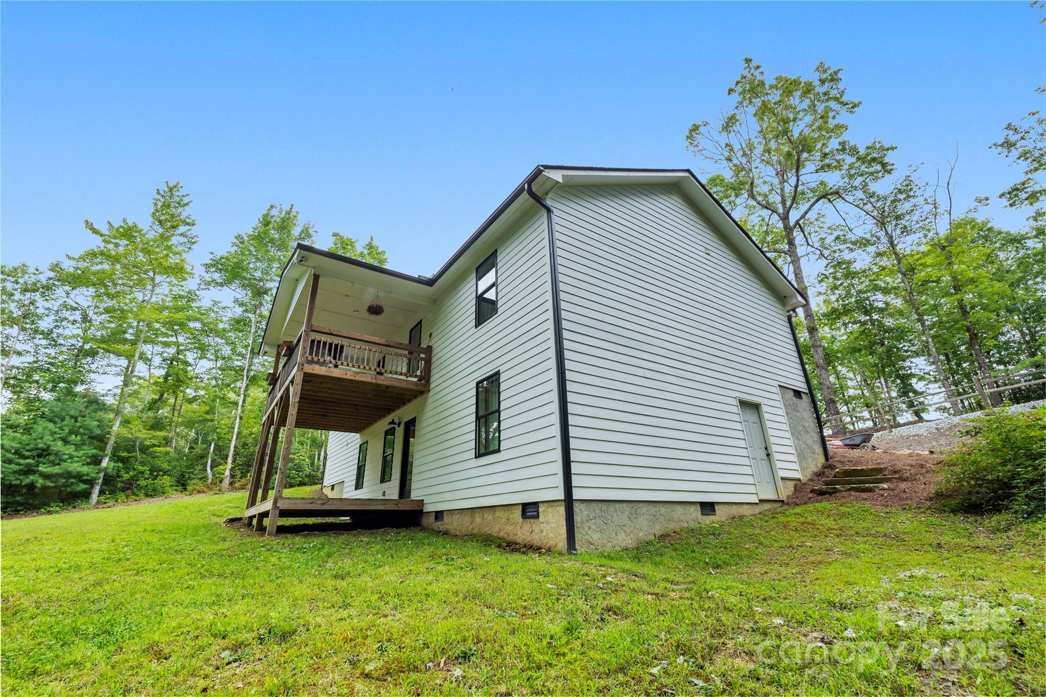 185 Ben Nevis Road Brevard, NC 28712 - Photo 33 of 42 a view of a house with a yard
