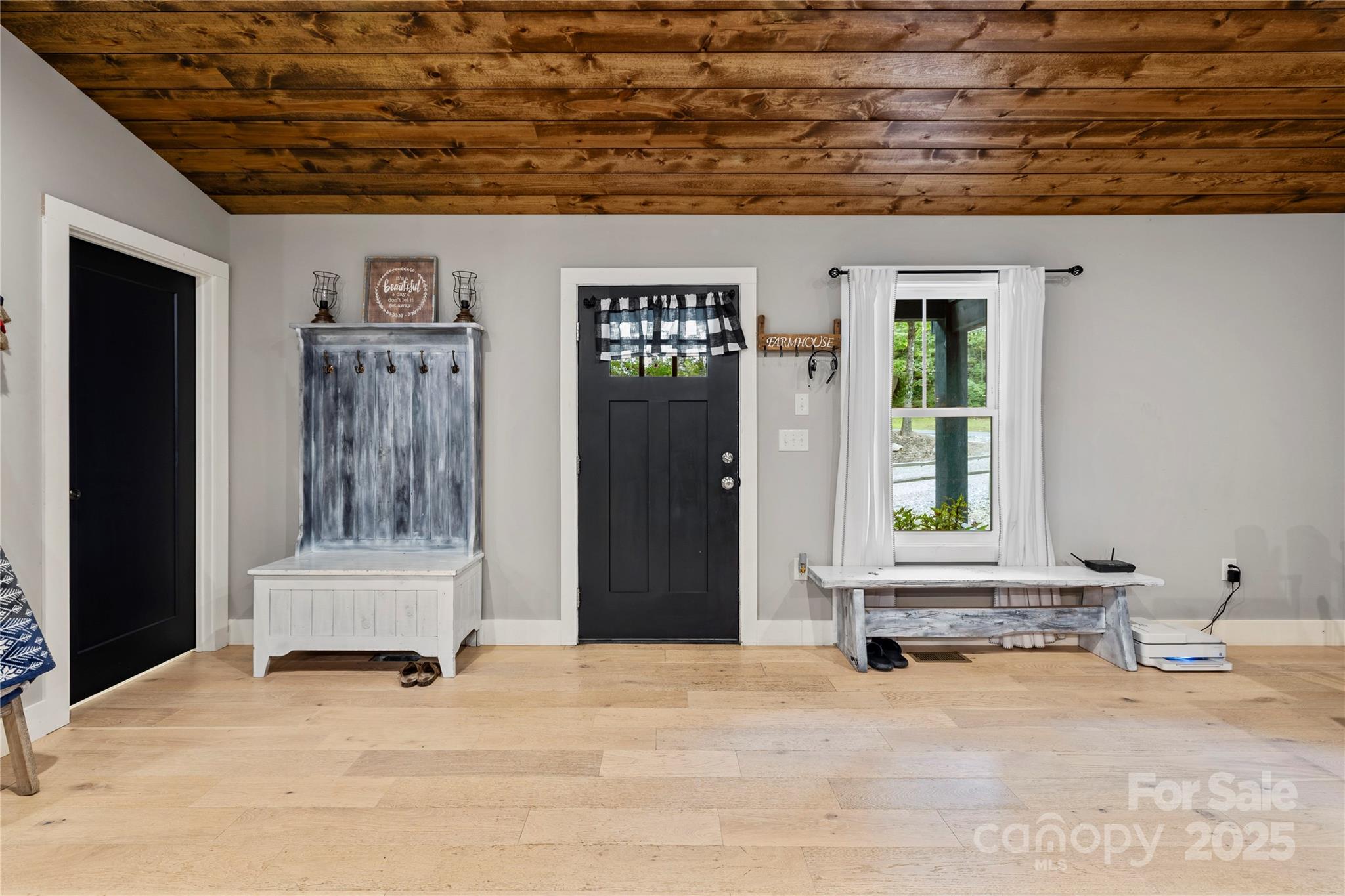 185 Ben Nevis Road Brevard, NC 28712 - Photo 6 of 42 a view of an entryway with a house