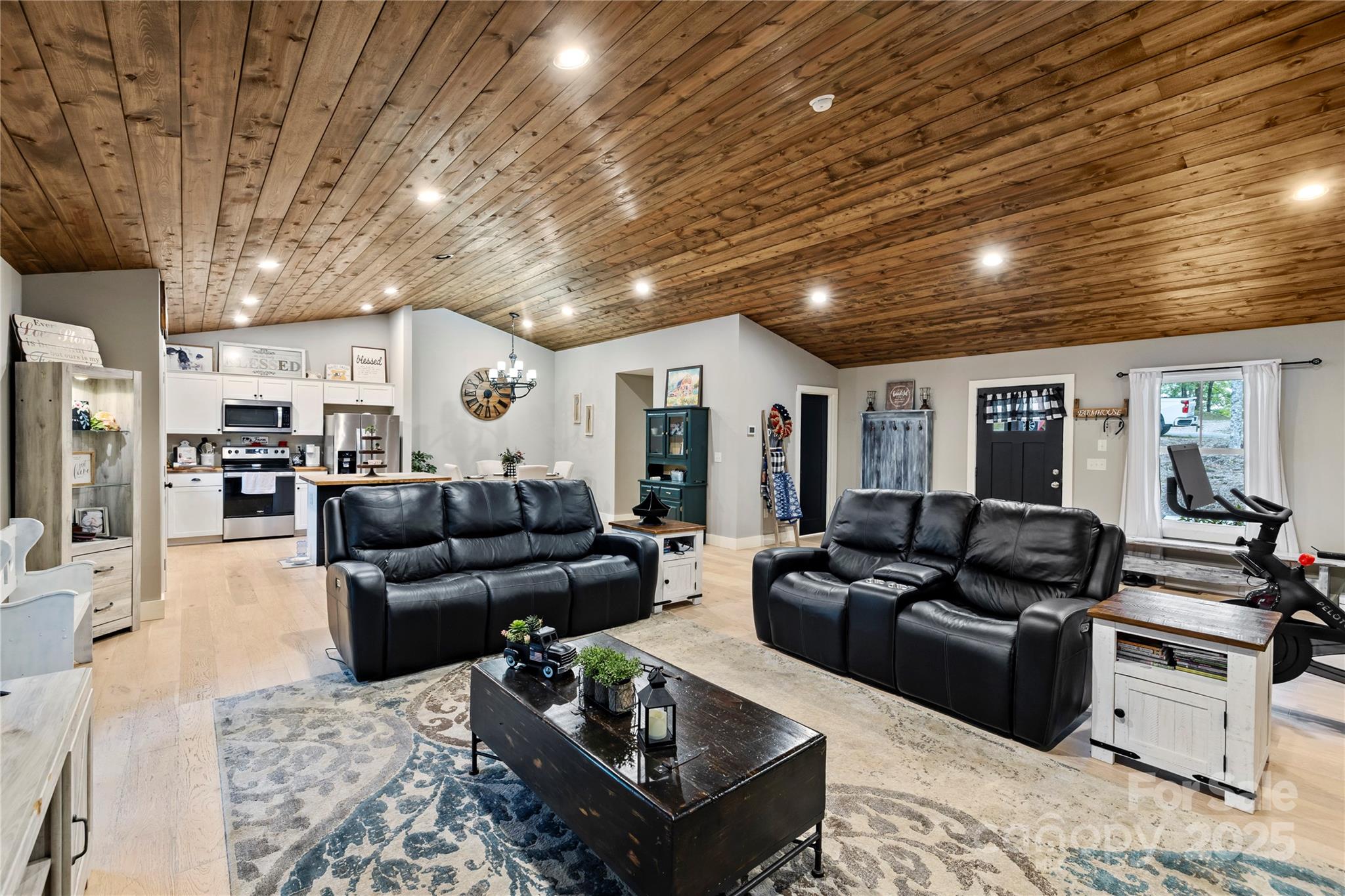 185 Ben Nevis Road Brevard, NC 28712 - Photo 8 of 42 a living room with furniture and kitchen view