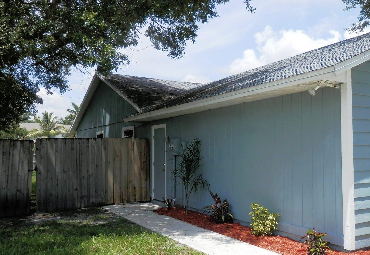 2252 Southeast Flanders Road Port St. Lucie, FL 34952 - Photo 20 of 24 PEDESTRIAN DOOR TO GARAGE