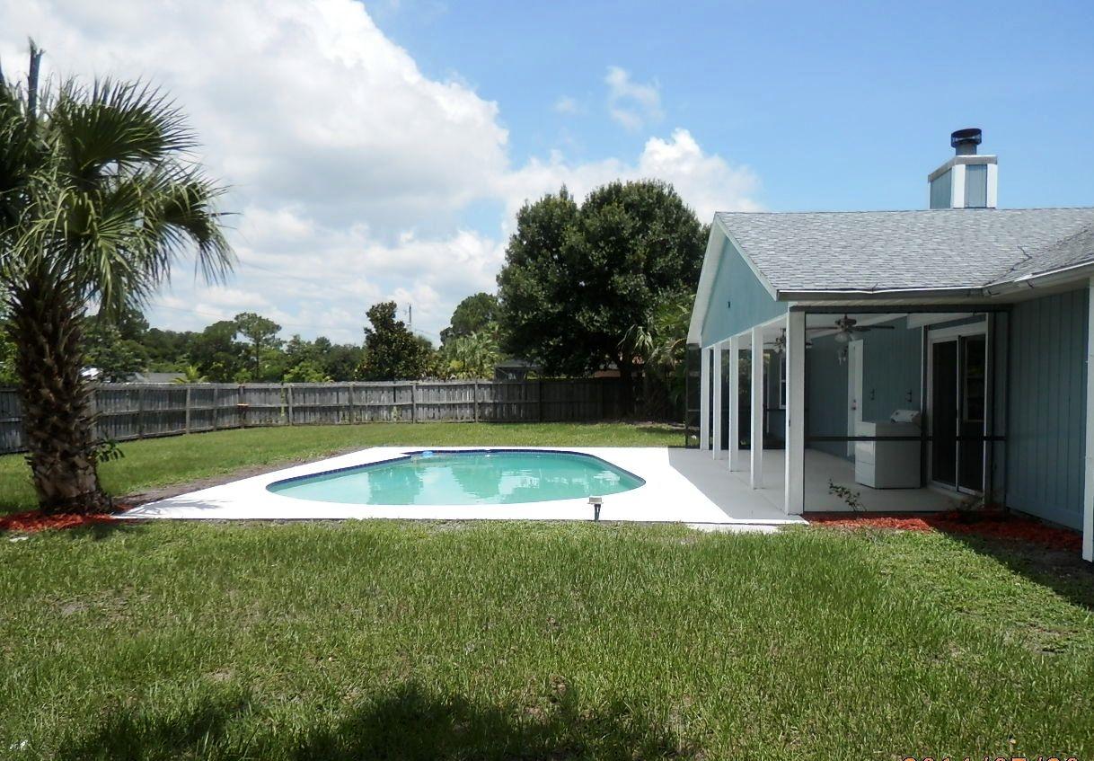 2252 Southeast Flanders Road Port St. Lucie, FL 34952 - Photo 7 of 24 HUGE YARD WITH POOL