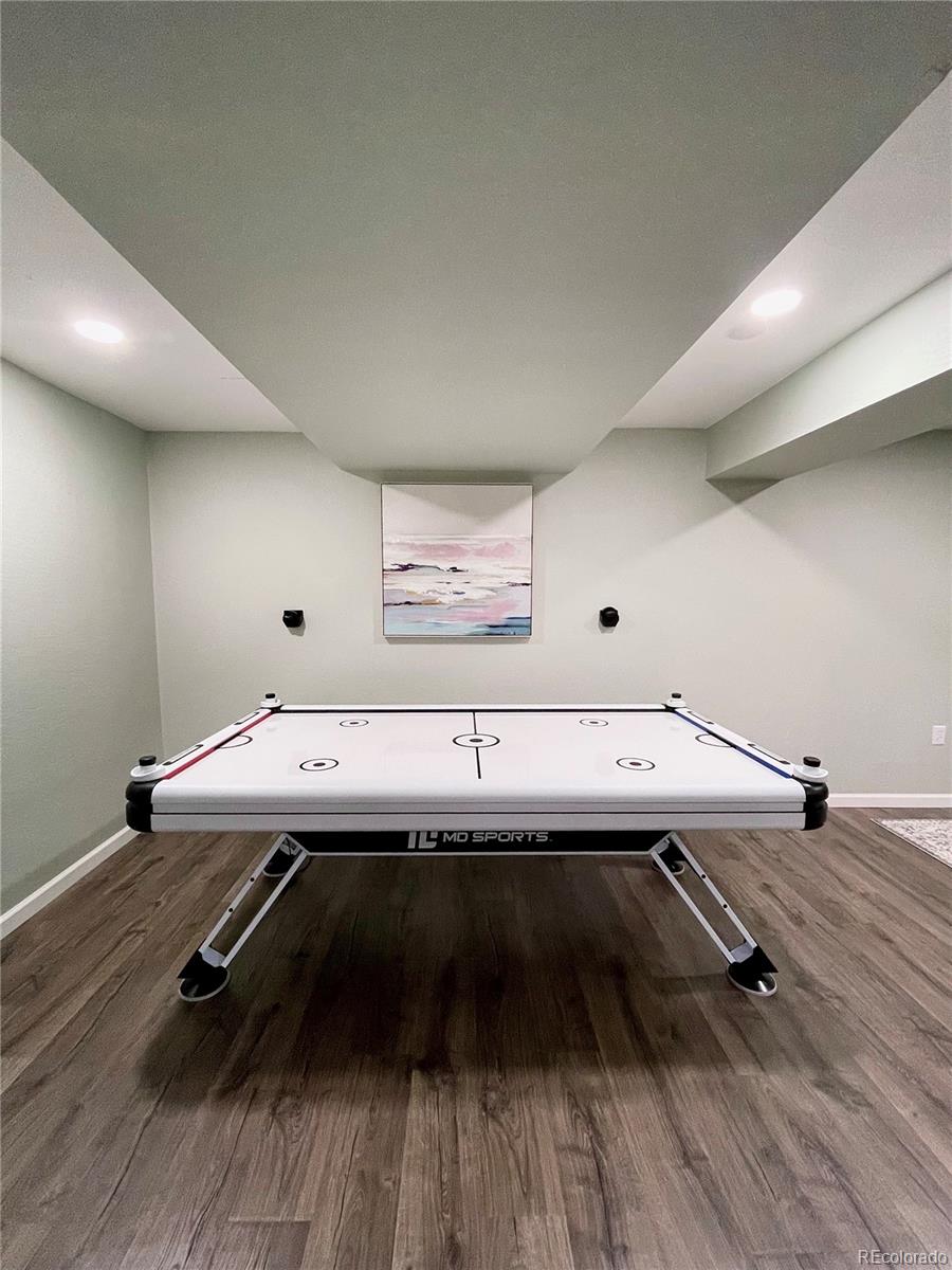 265 Caesar Road Black Hawk, CO 80422 - Photo 37 of 42 a room with wooden floor and pool table