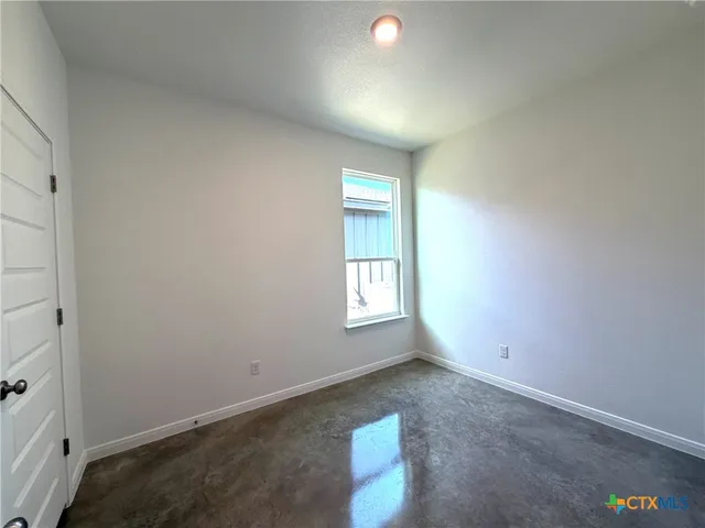 a view of a house with backyard and a yard