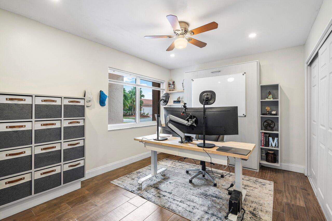 8541 Nadmar Avenue Boca Raton, FL 33434 - Photo 17 of 39 a work room with furniture and a window