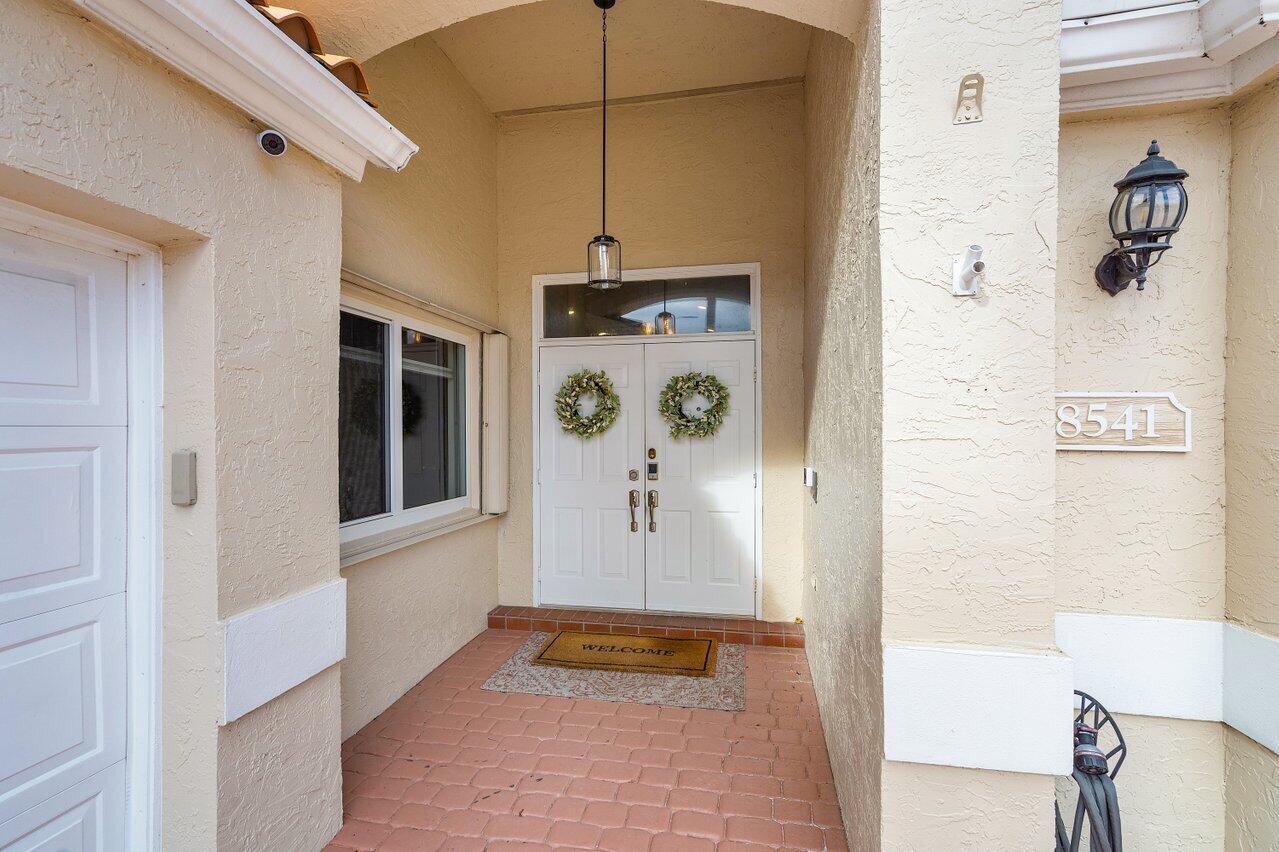 8541 Nadmar Avenue Boca Raton, FL 33434 - Photo 3 of 39 a bathroom with a shower