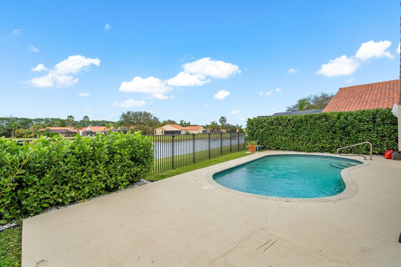8541 Nadmar Avenue Boca Raton, FL 33434 - Photo 31 of 39 a view of outdoor space and garden