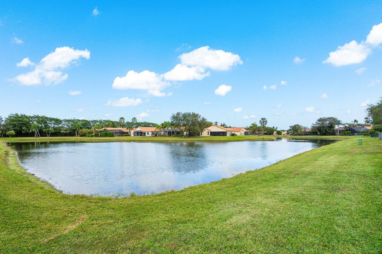 8541 Nadmar Avenue Boca Raton, FL 33434 - Photo 34 of 39 a view of a lake with a city