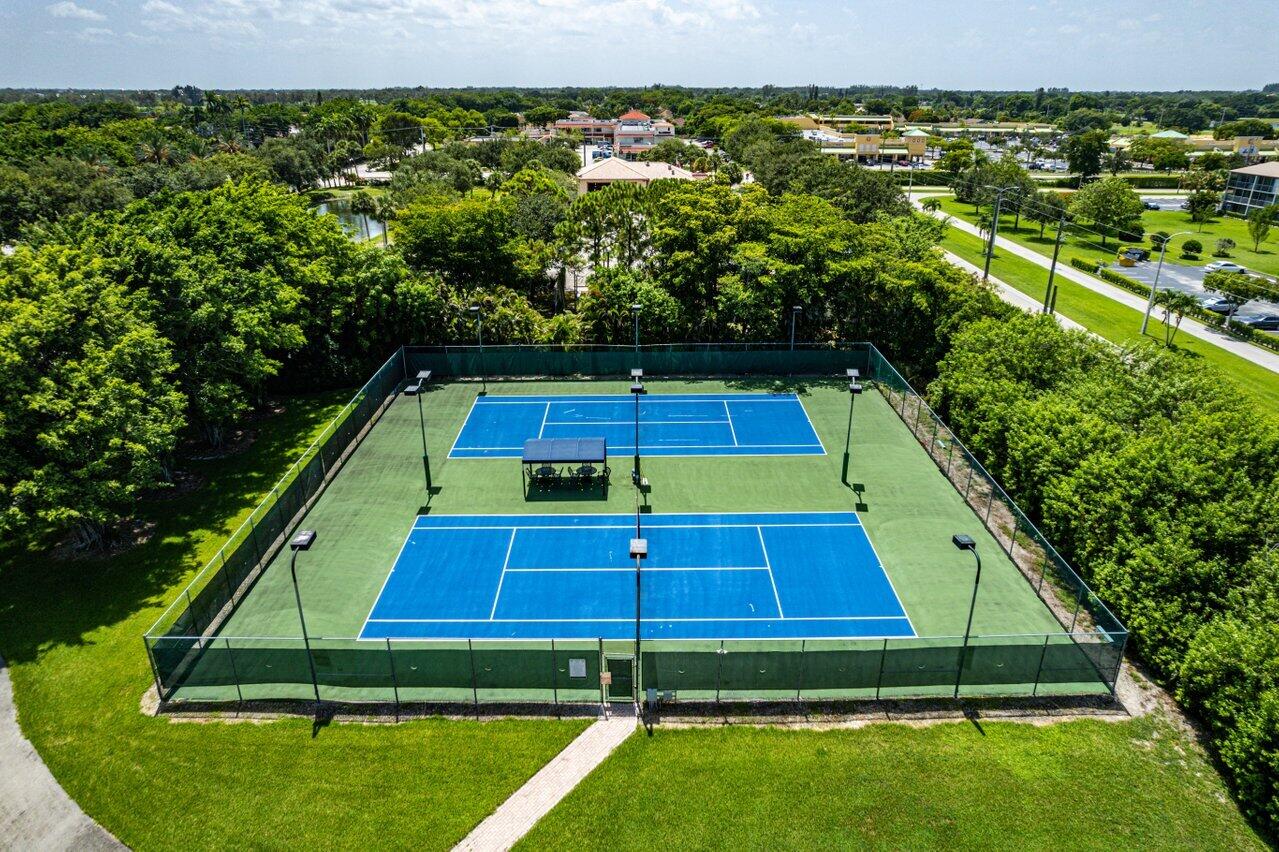 8541 Nadmar Avenue Boca Raton, FL 33434 - Photo 37 of 39 a view of a tennis court