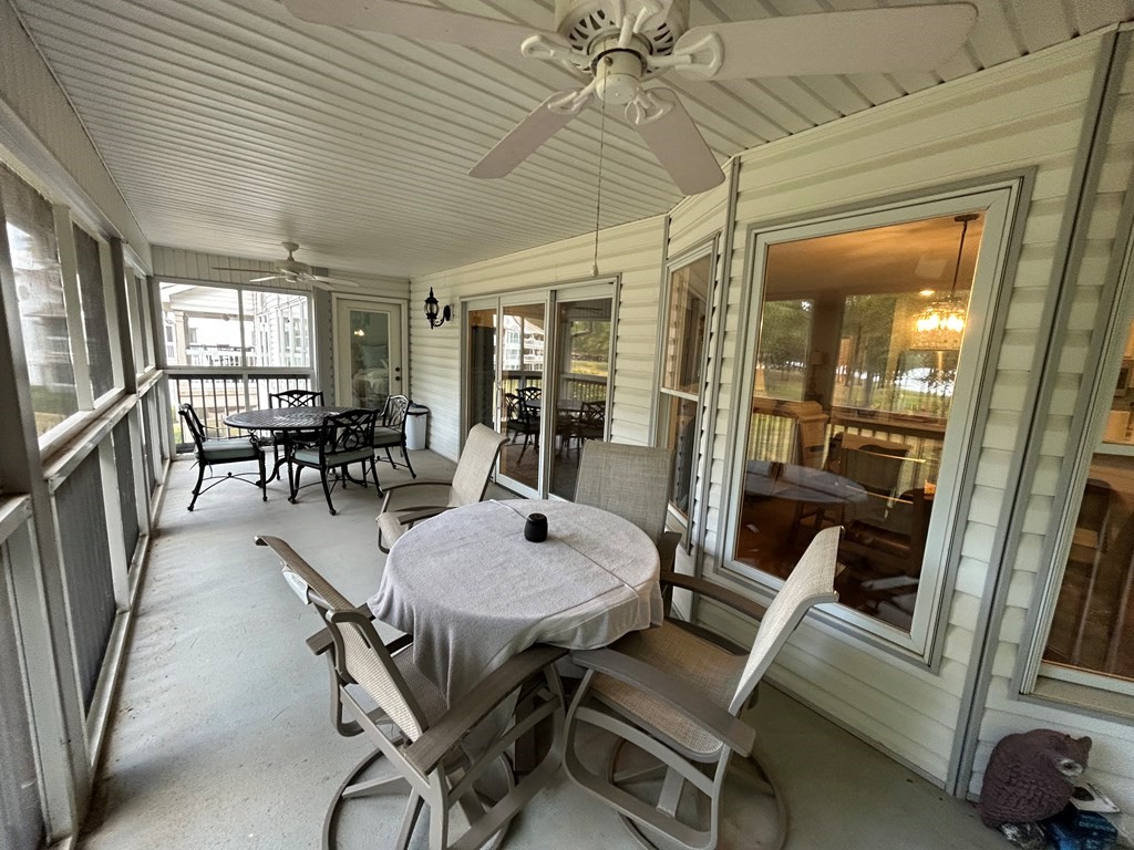 35 Pleasant Lane, Unit F3 Springville, TN 38256 - Photo 19 of 22 a view of a dining room with furniture window and wooden floor