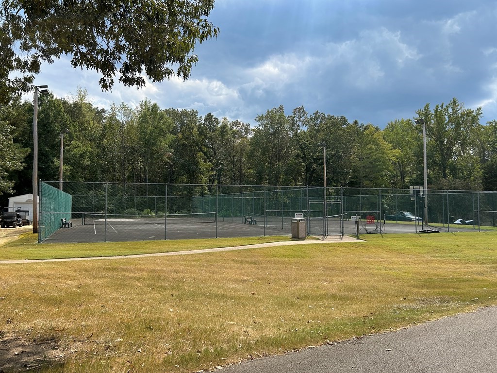 35 Pleasant Lane, Unit F3 Springville, TN 38256 - Photo 21 of 22 a view of a swimming pool with an outdoor space and seating area