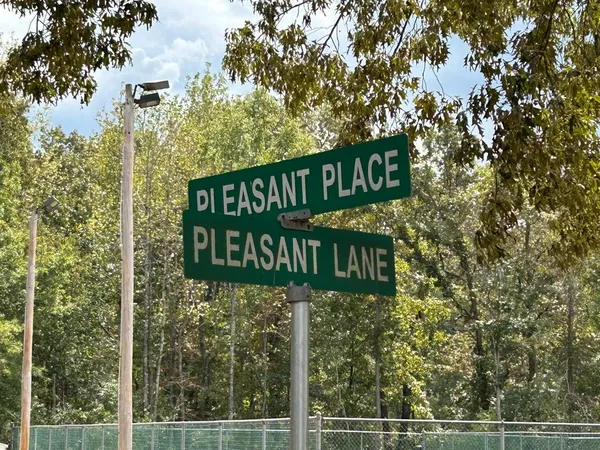 a street sign that is sitting on a pole