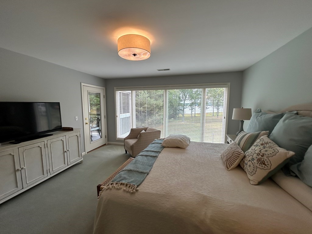 35 Pleasant Lane, Unit F3 Springville, TN 38256 - Photo 9 of 22 a living room with furniture and a flat screen tv
