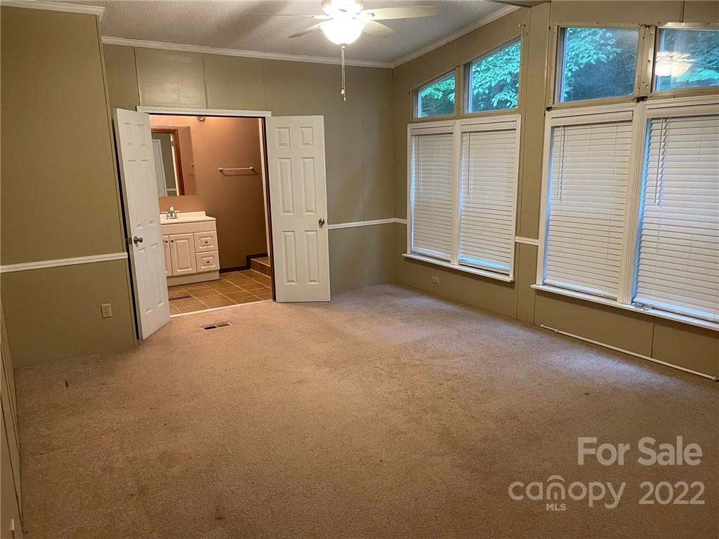 1682 Laughter Road Mill Spring, NC 28756 - Photo 13 of 24 a view of a storage & utility room