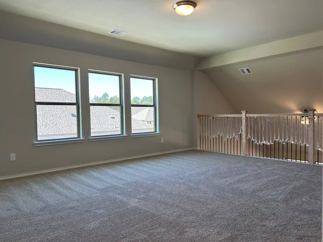 a front view of a house with garage