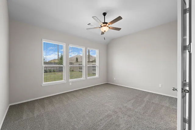 a bathroom with a double vanity sink a mirror and a bathtub