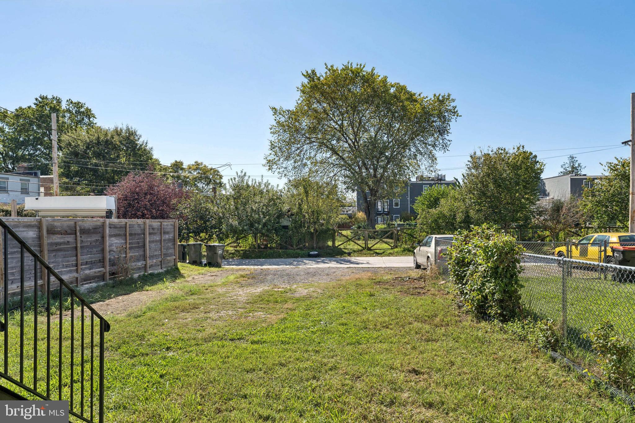 2021 E Street Northeast, Unit 4 Washington, DC 20002 - Photo 14 of 15 a view of a backyard with wooden fence