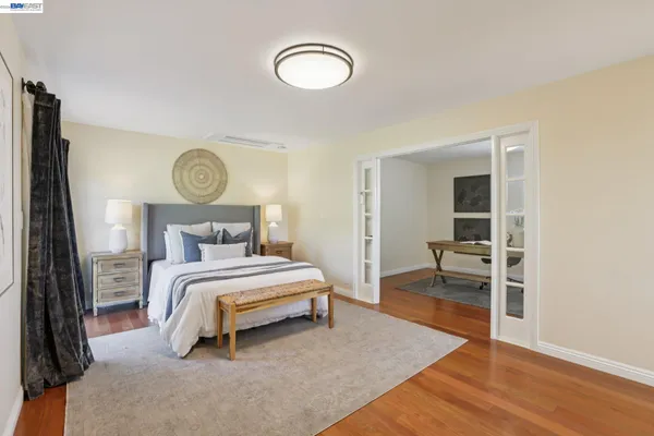 a bathroom with 2 sink and a mirror