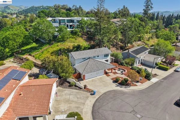 a backyard of a house with lots of green space