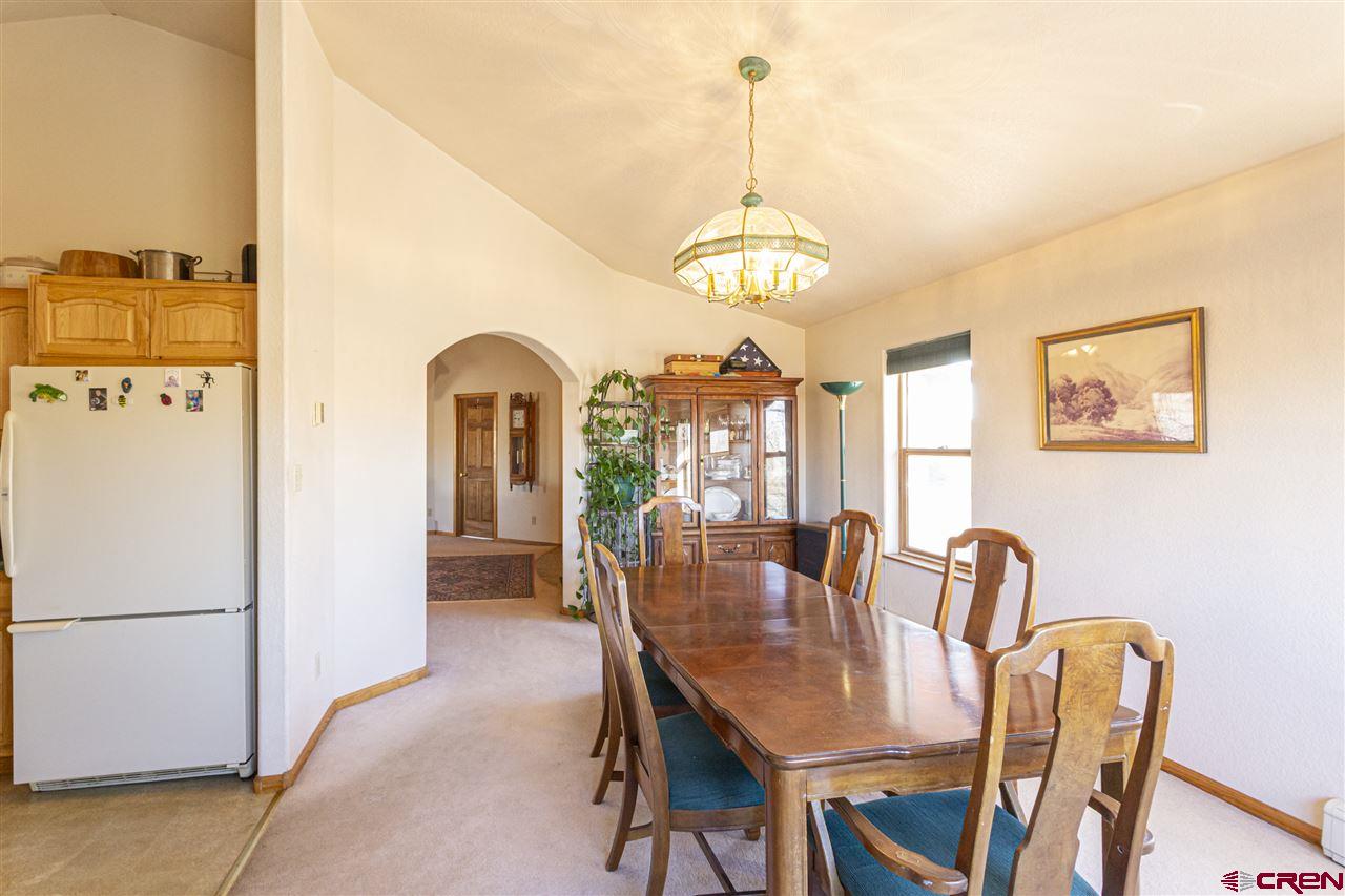 959 1200th Road Delta, CO 81416 - Photo 20 of 34 a view of a dining room with furniture window and outside view
